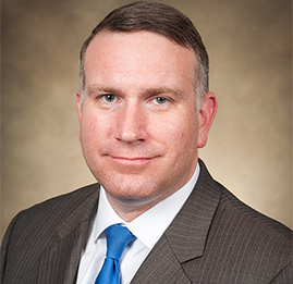 Dr. Lawrence “Lars” Powell