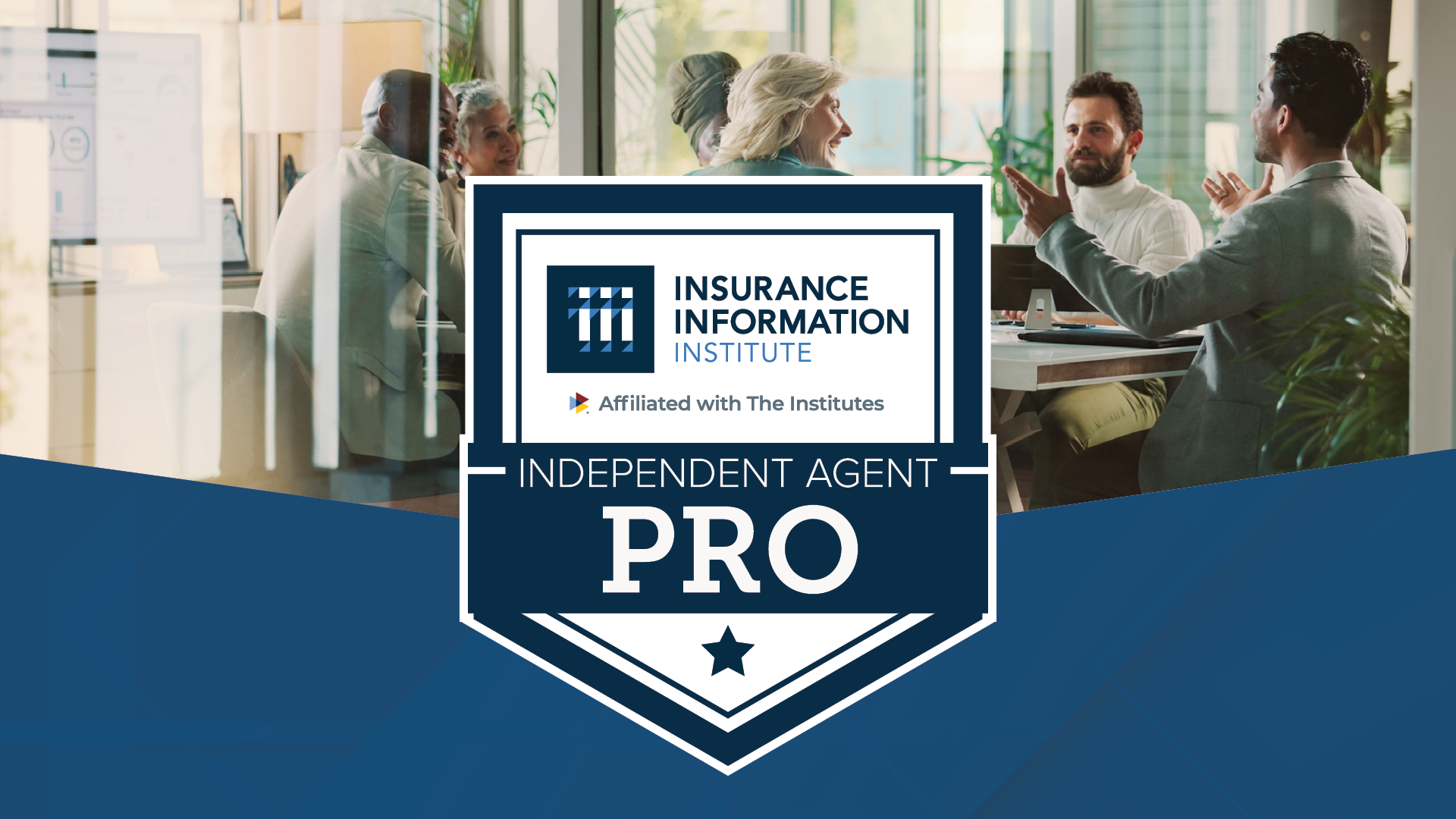 Independent Agent Pro logo in front of a group of people have a discussion.